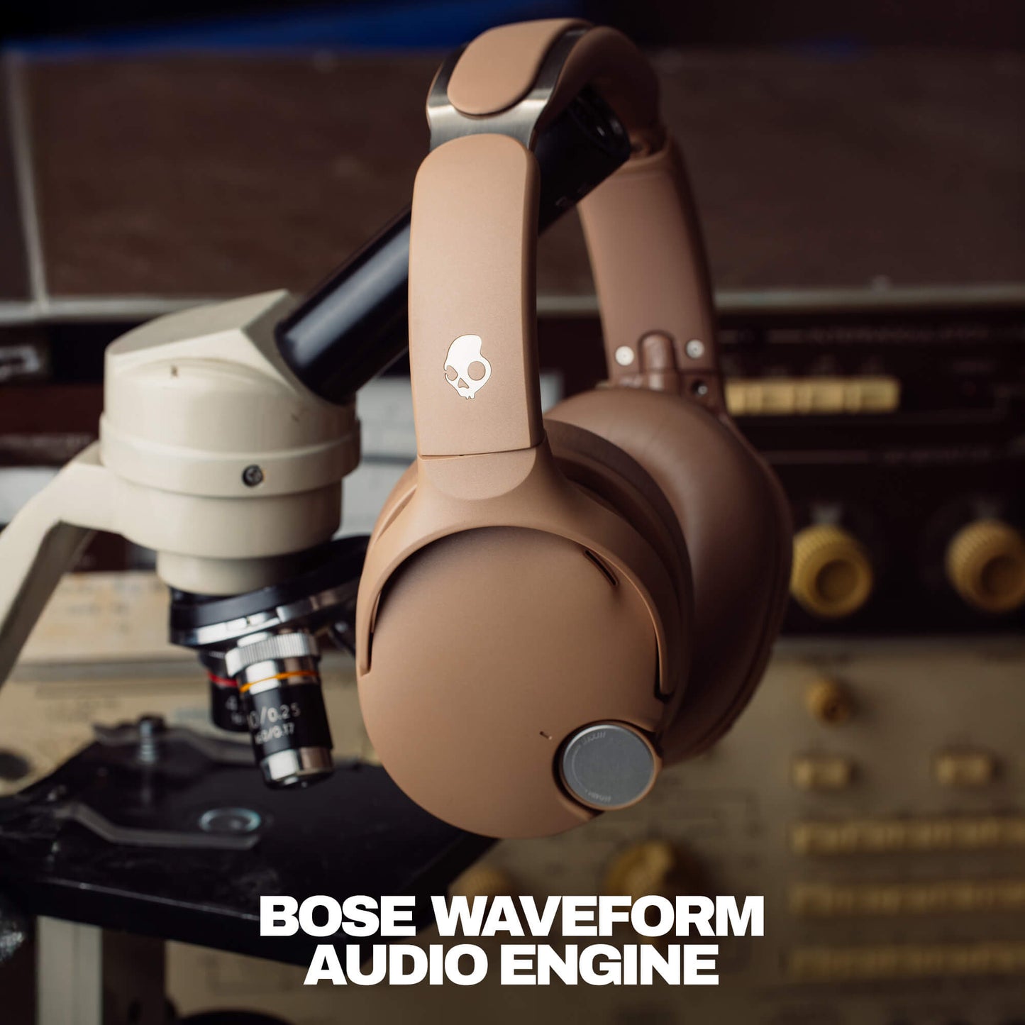 Skullcandy headphones on a vintage audio equipment background with 'Bose Waveform Audio Engine' text. | Primer