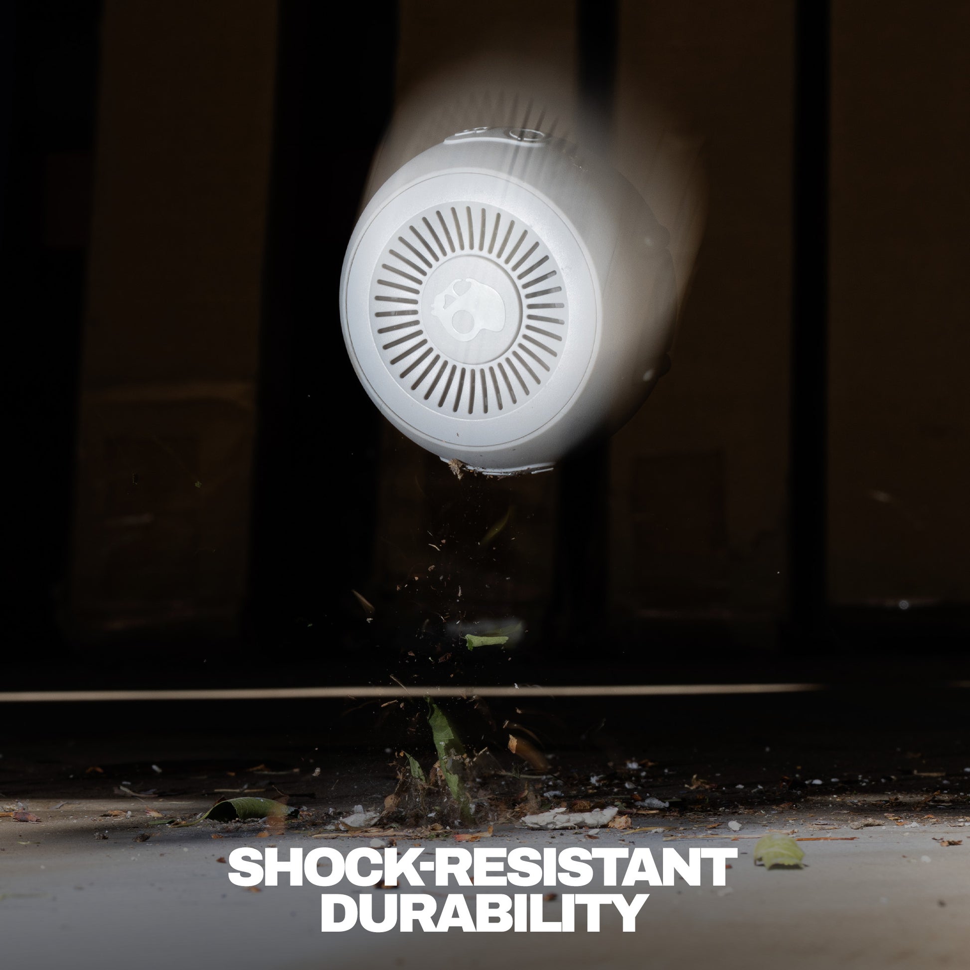 Round shockproof device with 'Shock-Resistant Durability' text on a dark background | Cement