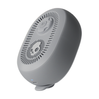 Gray electronic device with a circular design on a white background | Cement